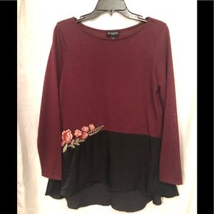 Gently worn burgundy and black top.